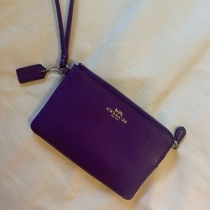 Purple genuine coach clutch
